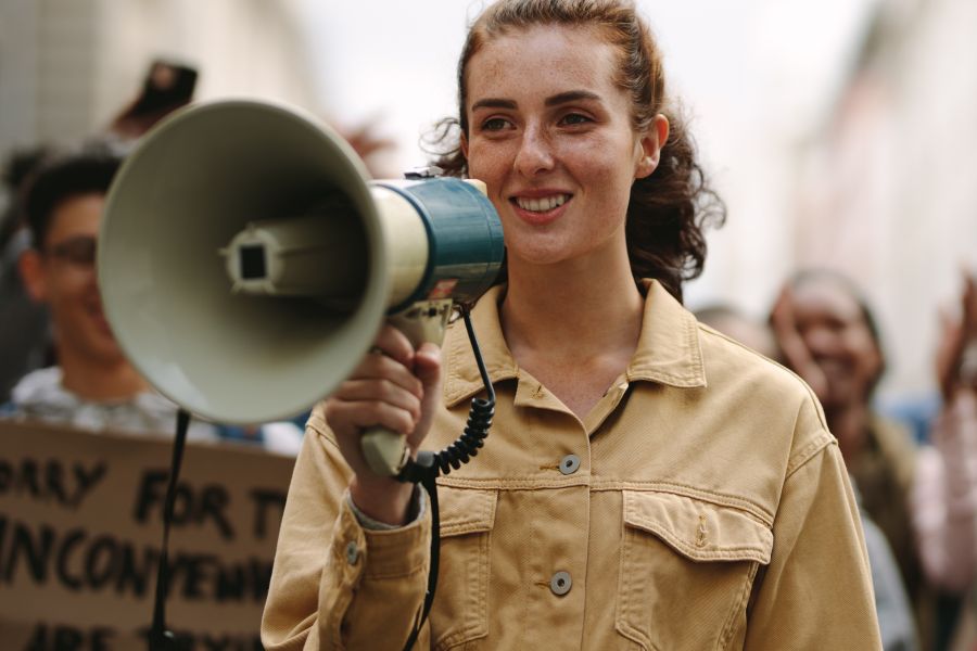 young woman with bullhorn